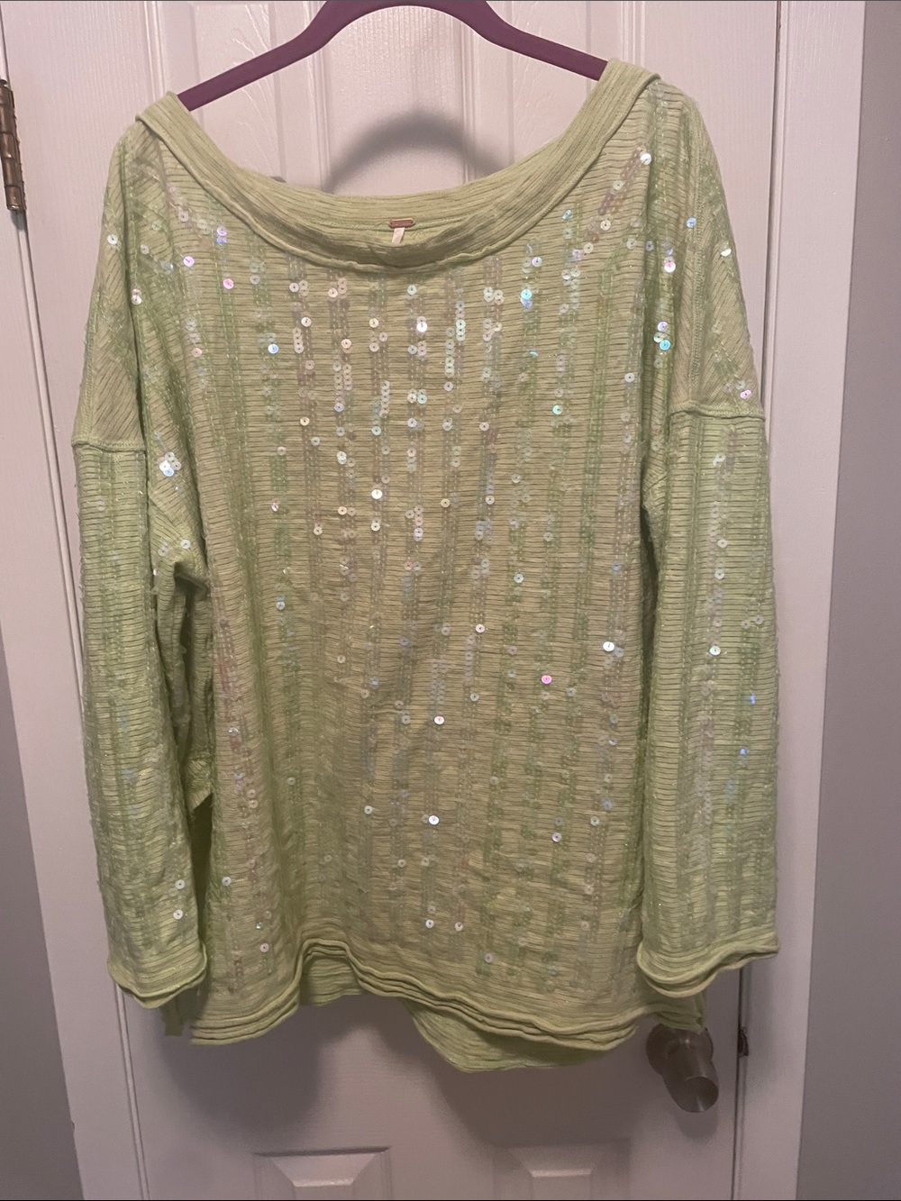 Free People size small will fit up to a large or extra large plenty of blink